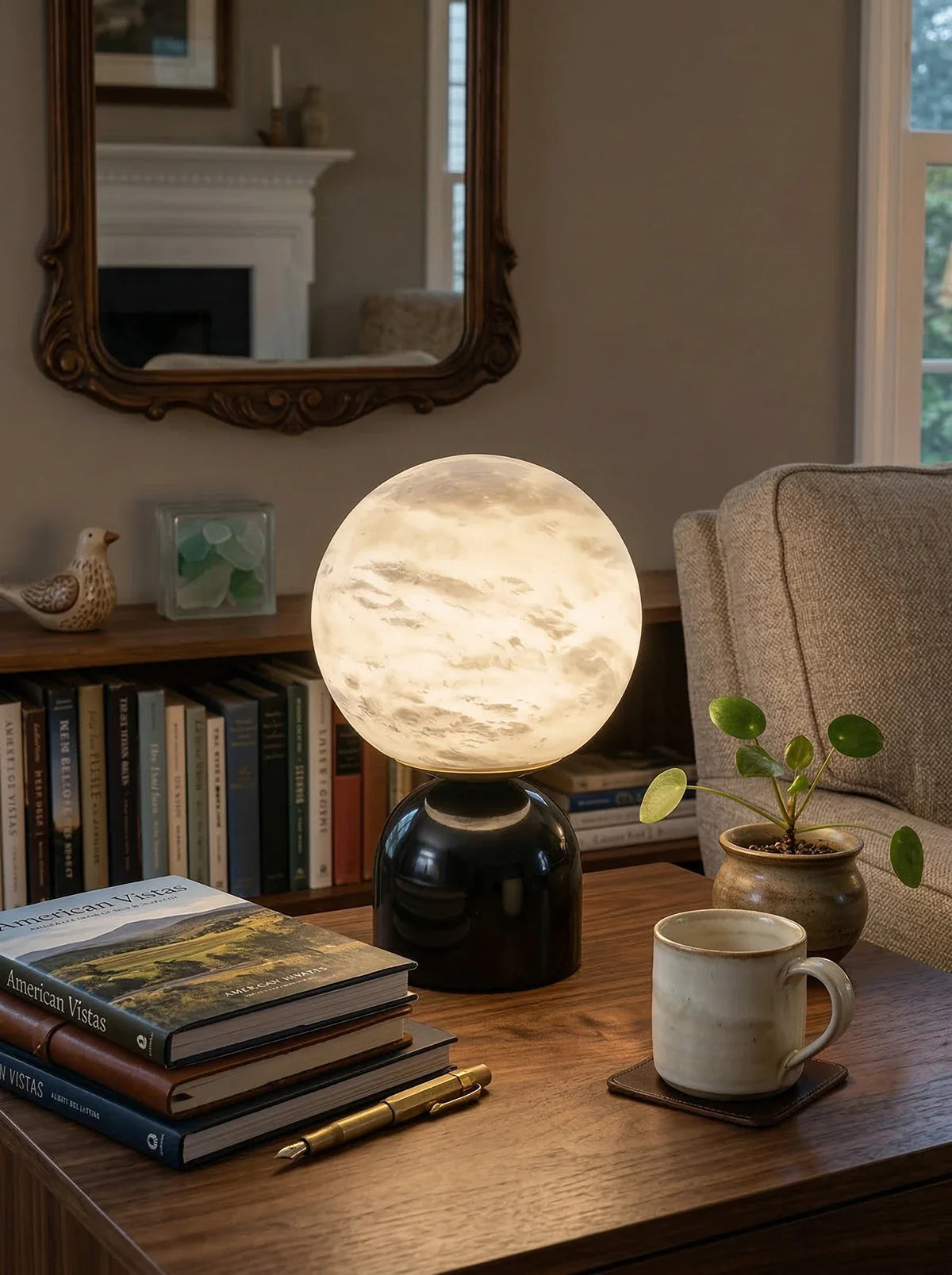 Round alabaster marble table lamp by Korewolamp, featuring a smooth, spherical design with warm marble tones and a modern aesthetic.