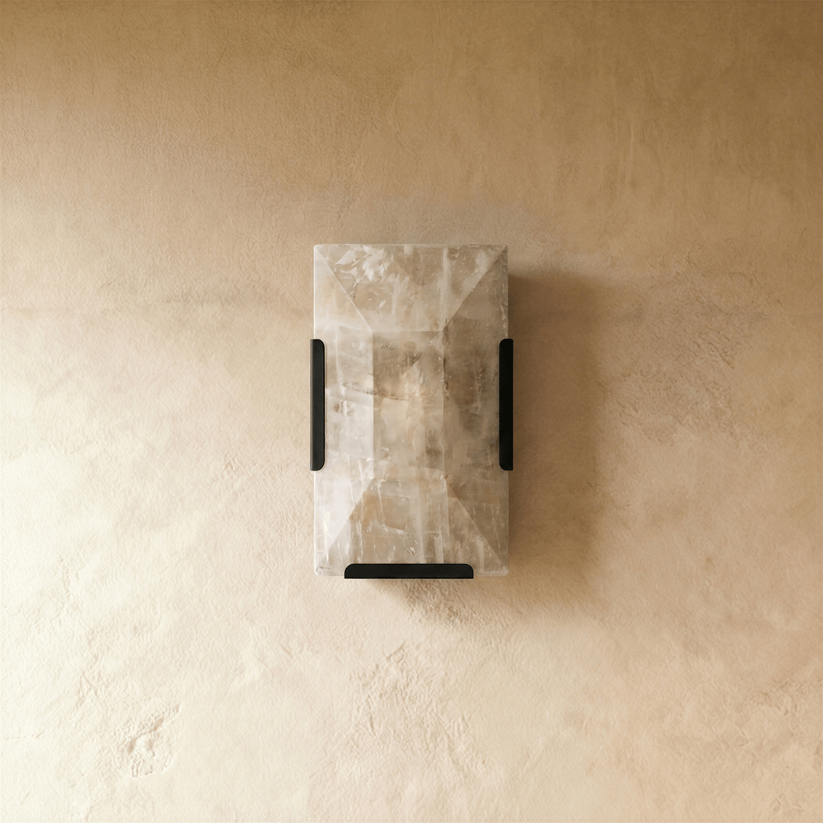 Sakhra Wall Lamp by Residence Supply, featuring a modern design with a textured stone finish and metal mounting bracket.