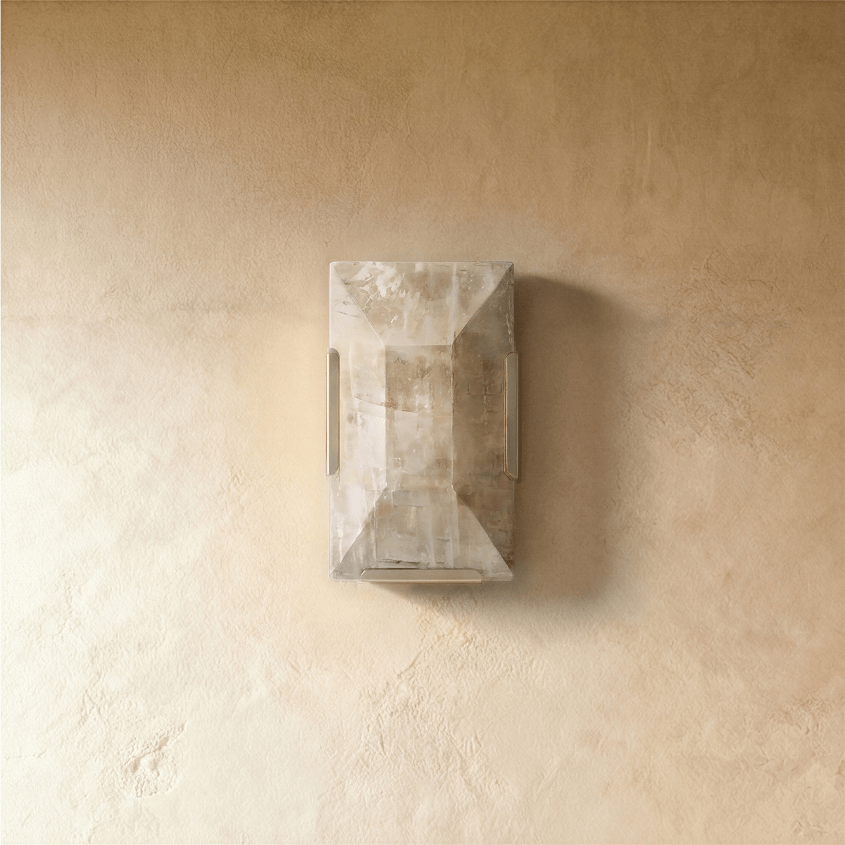 Sakhra Wall Lamp by Residence Supply featuring a rustic metal design with a warm glow for indoor or outdoor use