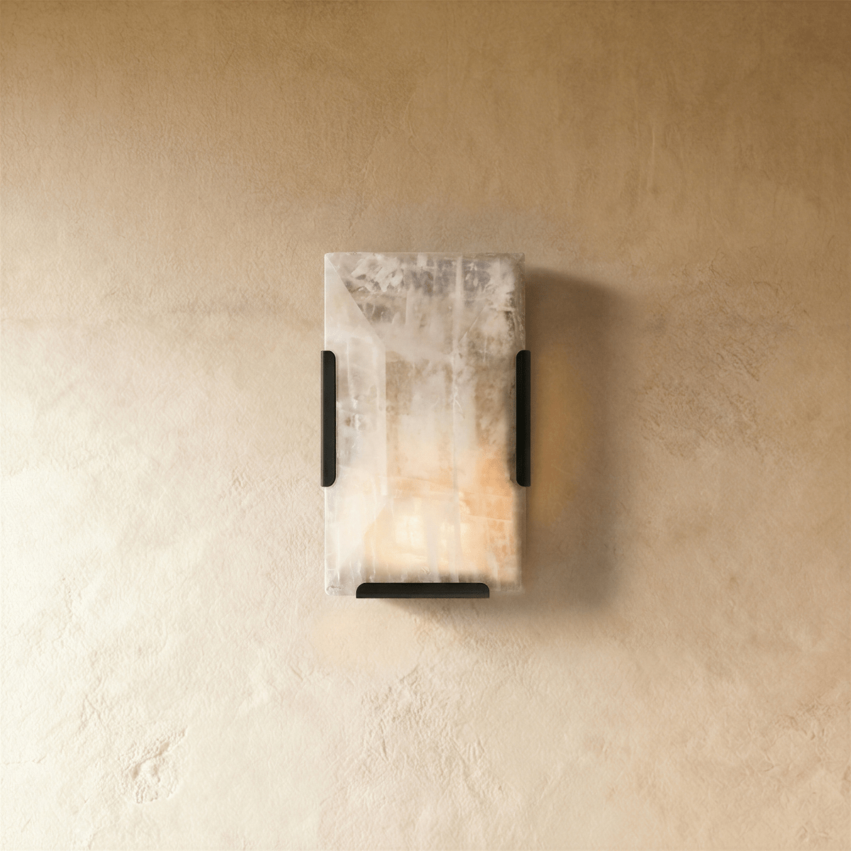 Modern Sakhra Wall Lamp by Residence Supply featuring a sleek design and warm lighting for contemporary home decor.