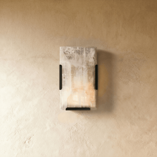 Modern Sakhra Wall Lamp by Residence Supply featuring a sleek design and warm lighting for contemporary home decor.