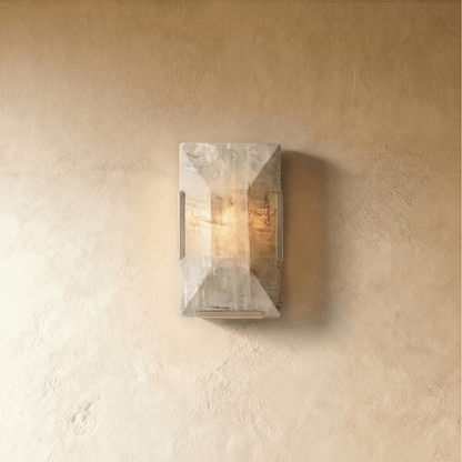 Sakhra Wall Lamp by Residence Supply featuring a modern, textured ceramic design with warm lighting for indoor wall decor