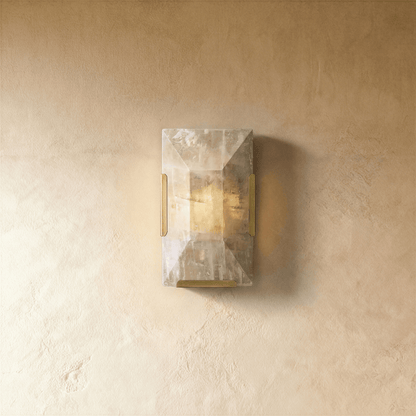 Residence Supply Sakhra Wall Lamp with textured ceramic finish and modern design mounted on a wall.
