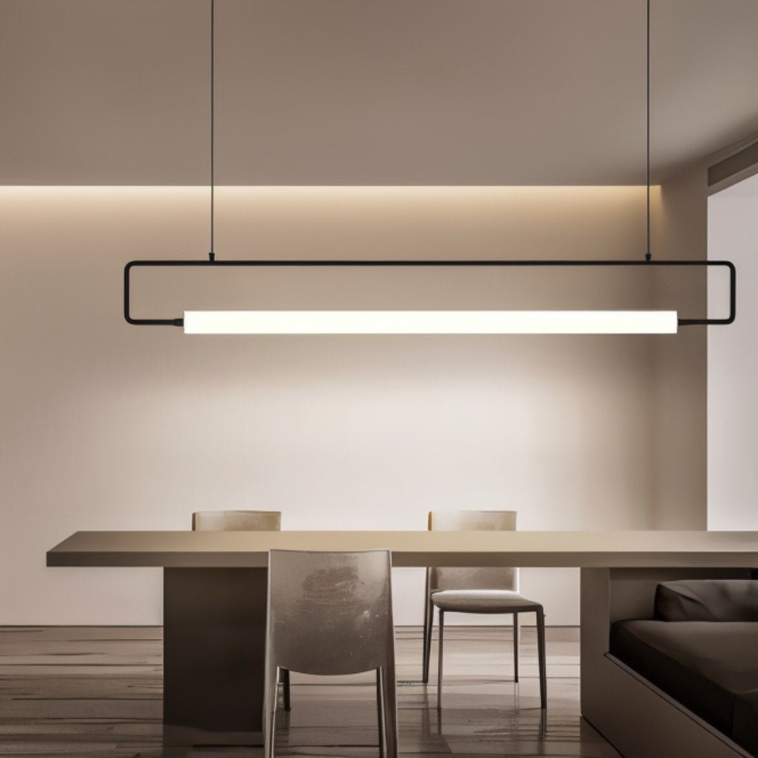 Sanaa Pendant Light by Residence Supply hanging from ceiling, featuring a modern design with a metallic finish and warm illumination.