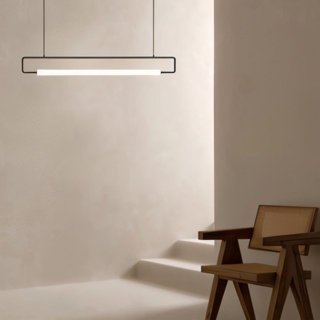 Modern Sanaa Pendant Light by Residence Supply with sleek metal design and warm ambient lighting.