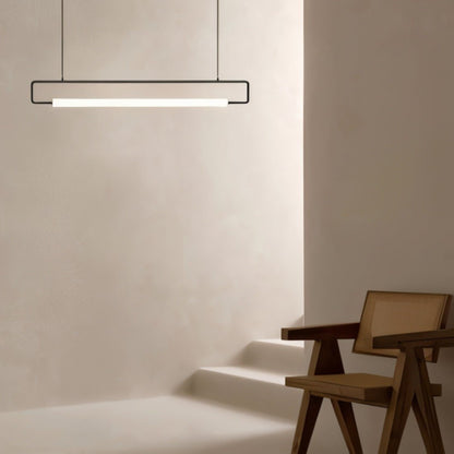 Modern Sanaa Pendant Light by Residence Supply with sleek metal design and warm ambient lighting.
