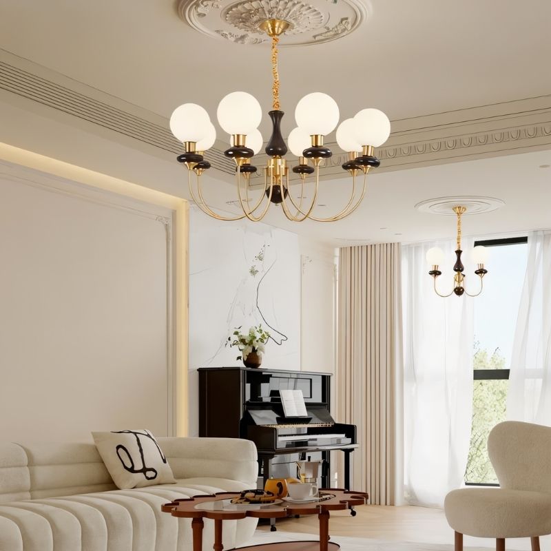 Elegant Scyre chandelier by Residence Supply featuring modern design with multiple light fixtures and sleek metal finish.
