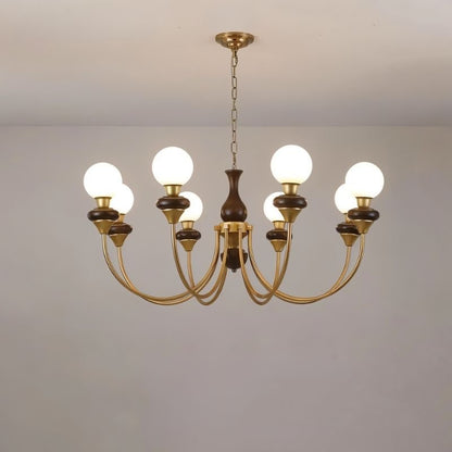 Elegant Scyre chandelier by Residence Supply featuring multiple hanging glass orbs and a modern metal frame.