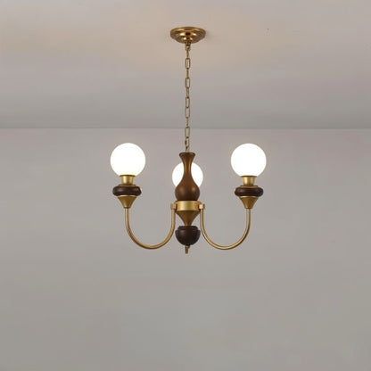Modern Scyre chandelier with sleek metal frame and multiple glass shades, designed for contemporary interior lighting by Residence Supply.