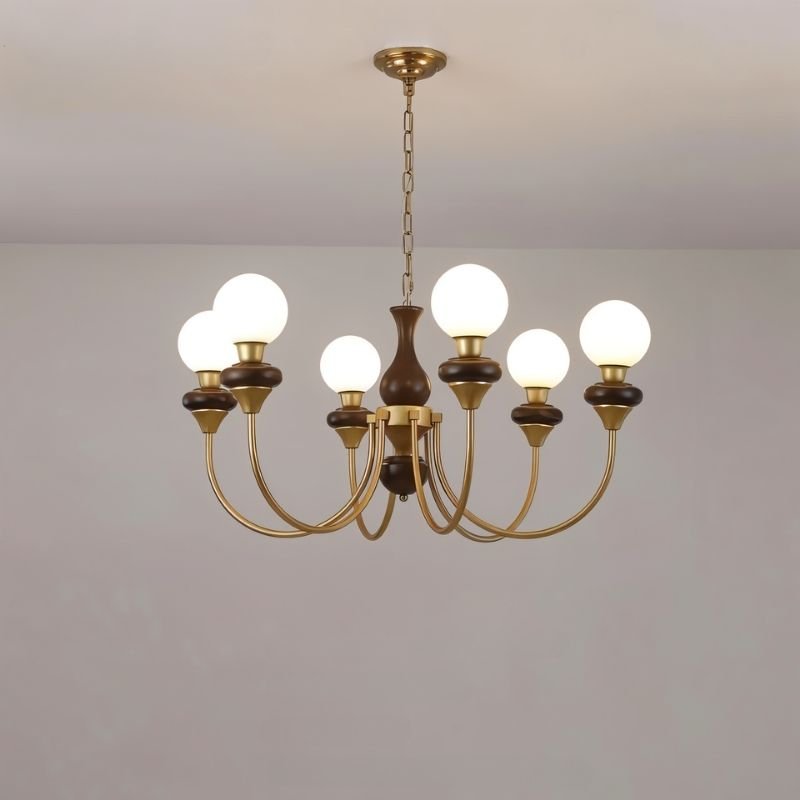 Elegant Scyre chandelier by Residence Supply featuring multiple glass globes and a sleek metal frame, ideal for modern lighting.