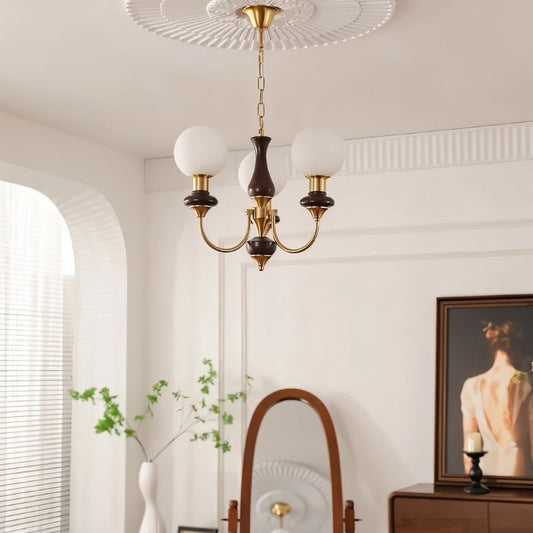 Elegant Scyre Chandelier by Residence Supply featuring a modern, multi-tiered design with glass and metal elements.