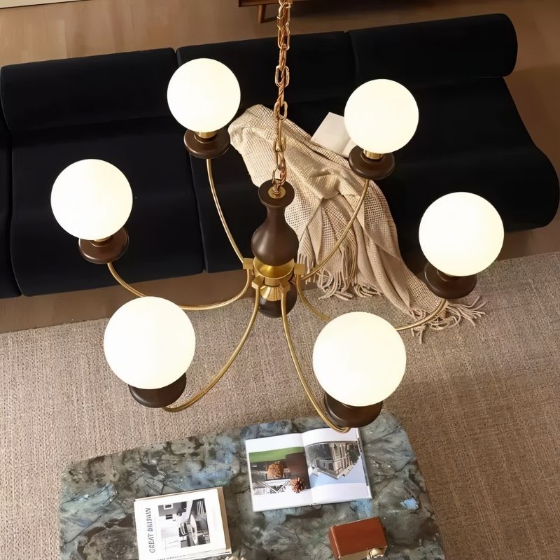 Elegant Scyre chandelier by Residence Supply featuring modern design with multiple hanging light fixtures and a sleek metal frame.