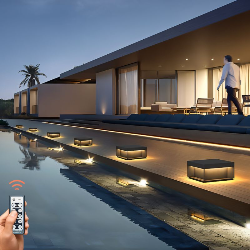 Senadina outdoor garden lamp by Residence Supply, featuring a sleek metal design with warm illumination suitable for outdoor spaces.
