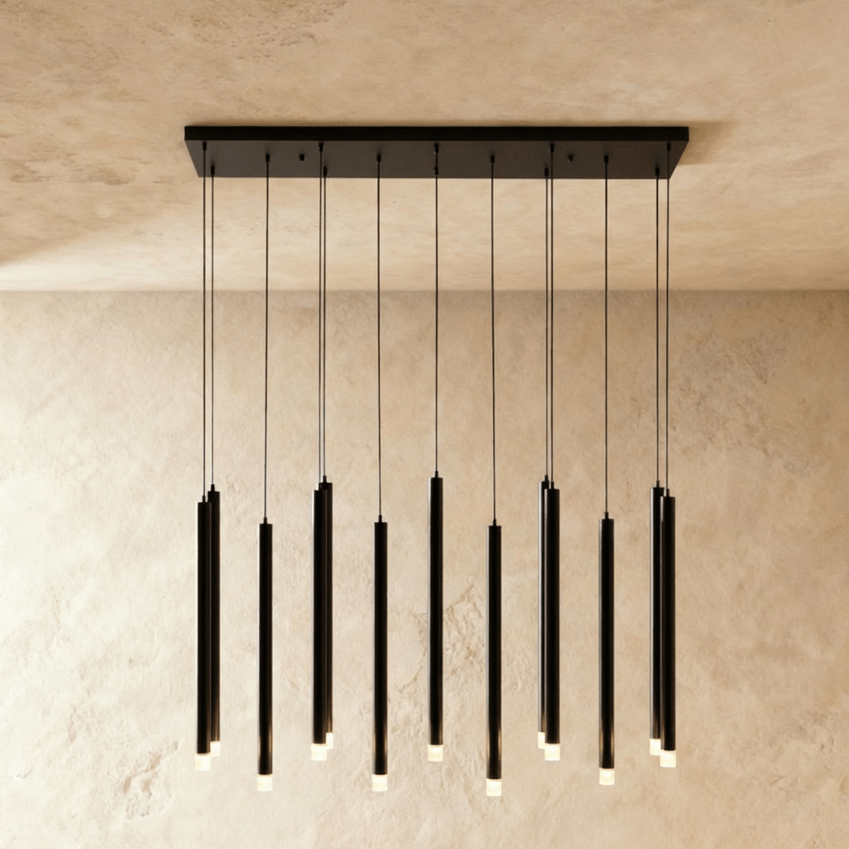 Elegant Senara Chandelier by Residence Supply featuring multiple glass light fixtures and a sleek metal frame.