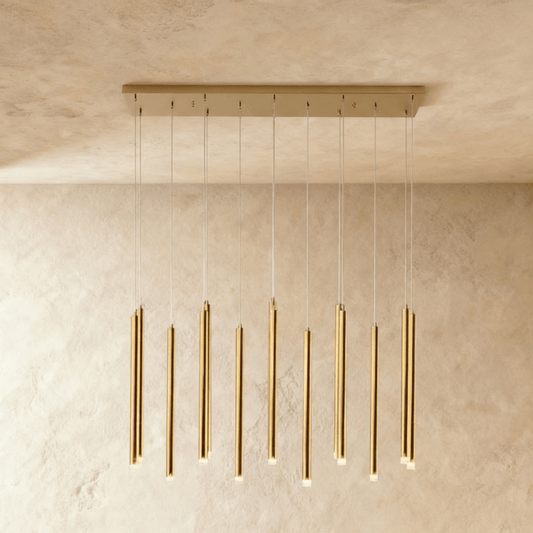 Elegant Senara chandelier by Residence Supply featuring multiple glass or crystal pendant lights hanging from a sleek metal frame.