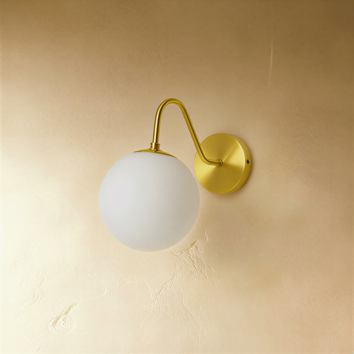 Modern Sfera Wall Lamp by Residence Supply, featuring a spherical design and sleek metal finish for contemporary interior decor.