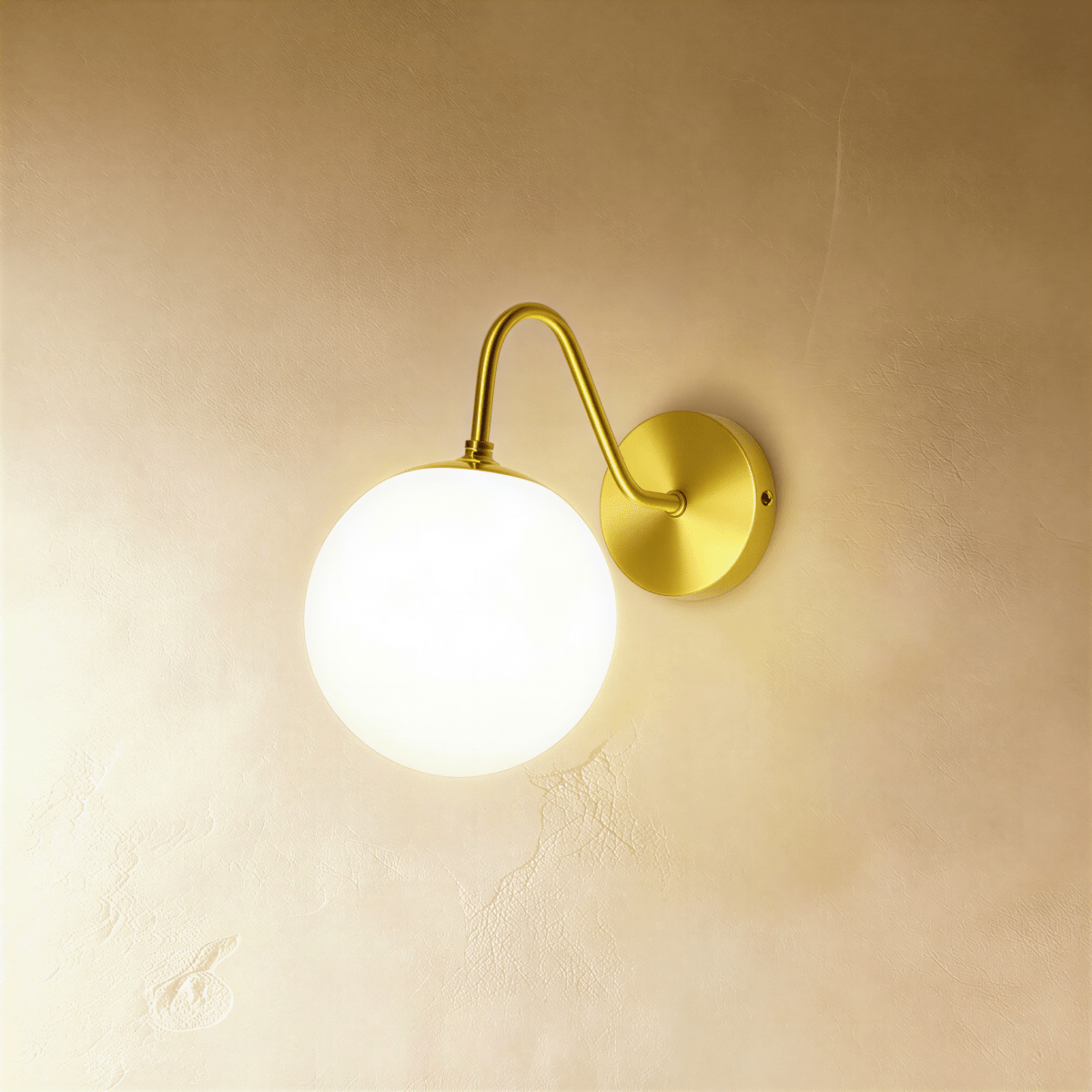 Modern Sfera Wall Lamp by Residence Supply, showcasing a sleek round design with a white finish mounted on a wall.
