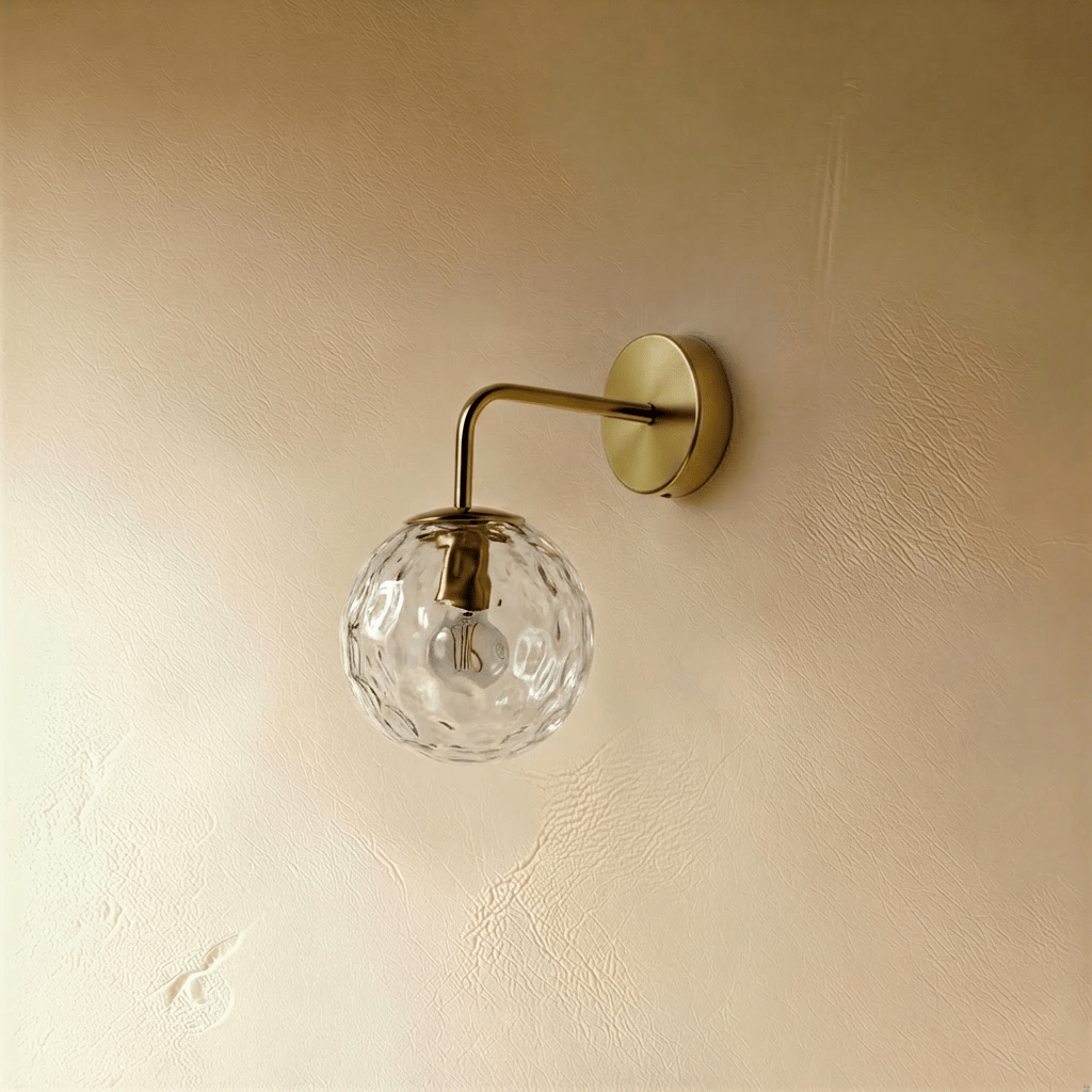Modern Sfera Wall Lamp by Residence Supply, featuring a sleek spherical design and wall-mounted installation.