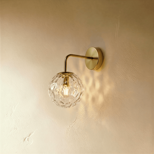 Modern Sfera Wall Lamp by Residence Supply featuring a spherical design with a sleek metal finish for stylish indoor lighting.
