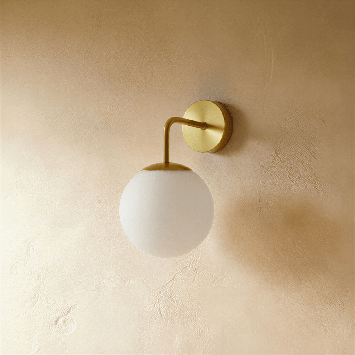 Modern Sfera Wall Lamp by Residence Supply with spherical glass shade and sleek metal wall mount, ideal for contemporary decor.