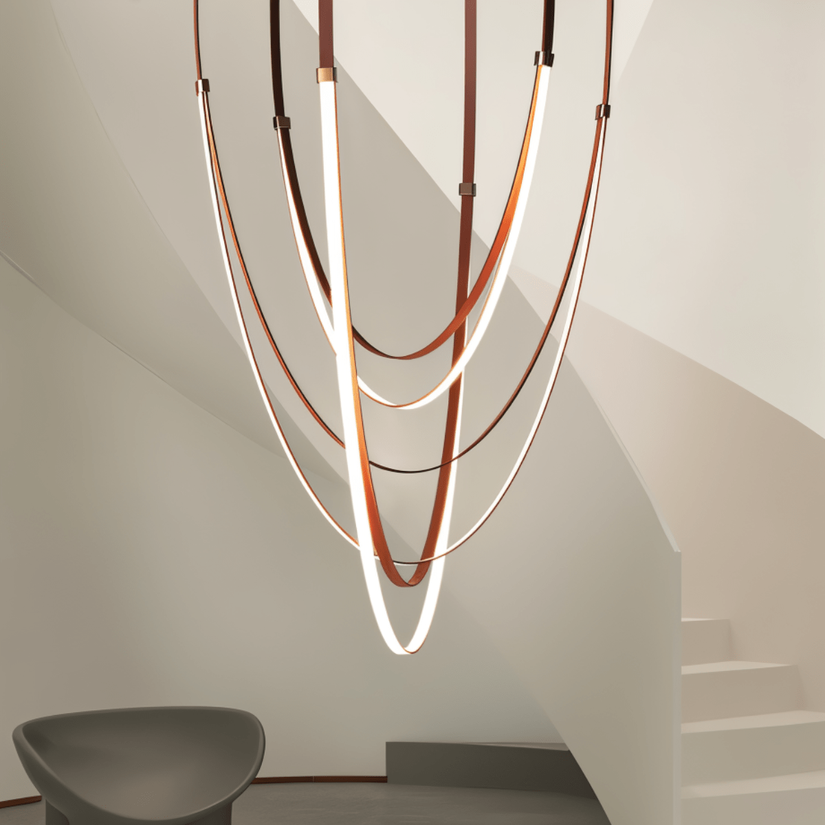 Elegant Shalom Leather Chandelier by Residence Supply with leather-wrapped design and multiple hanging light fixtures.