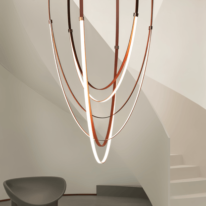 Elegant Shalom Leather Chandelier by Residence Supply with leather-wrapped design and multiple hanging light fixtures.