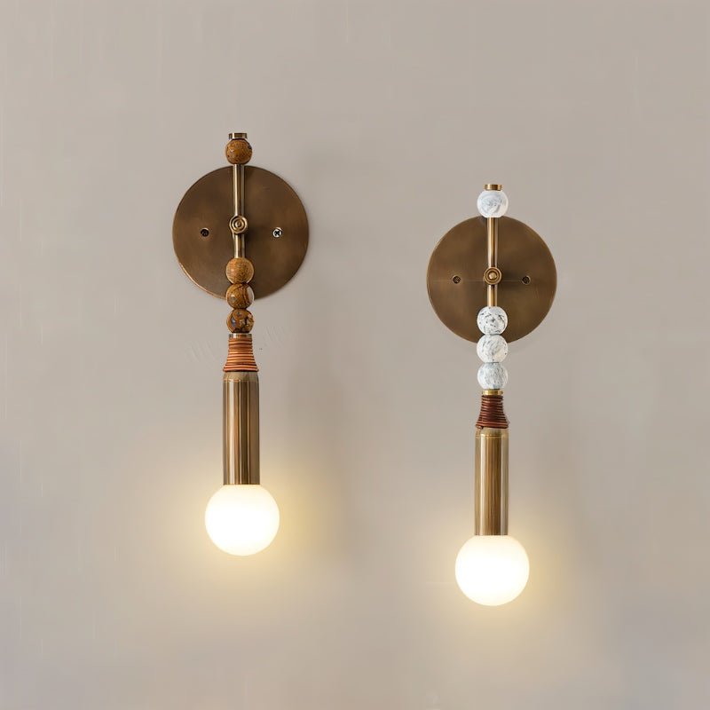 Shalti Wall Lamp by Residence Supply, modern wall-mounted lighting fixture with sleek design and matte finish on a white wall.