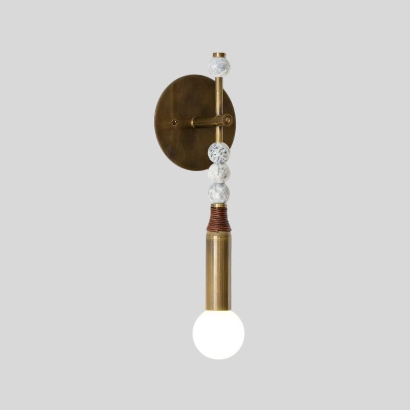 Residence Supply Shalti Wall Lamp with sleek modern design and brushed metal finish mounted on a wall