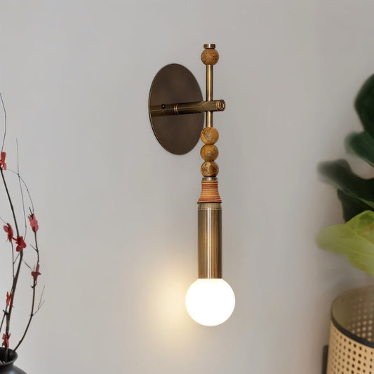 Residence Supply Shalti Wall Lamp with modern design, featuring a sleek metal finish and warm lighting for interior decor.