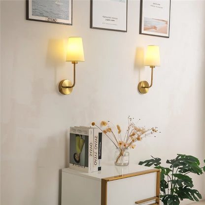 Shira Wall Lamp by Residence Supply, featuring modern design with a sleek metal finish and an adjustable arm.