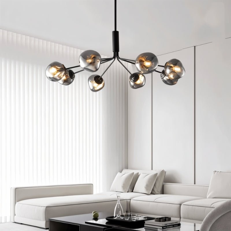 Modern Sindr ceiling lamp by Residence Supply with sleek design and warm lighting, ideal for living rooms or bedrooms.