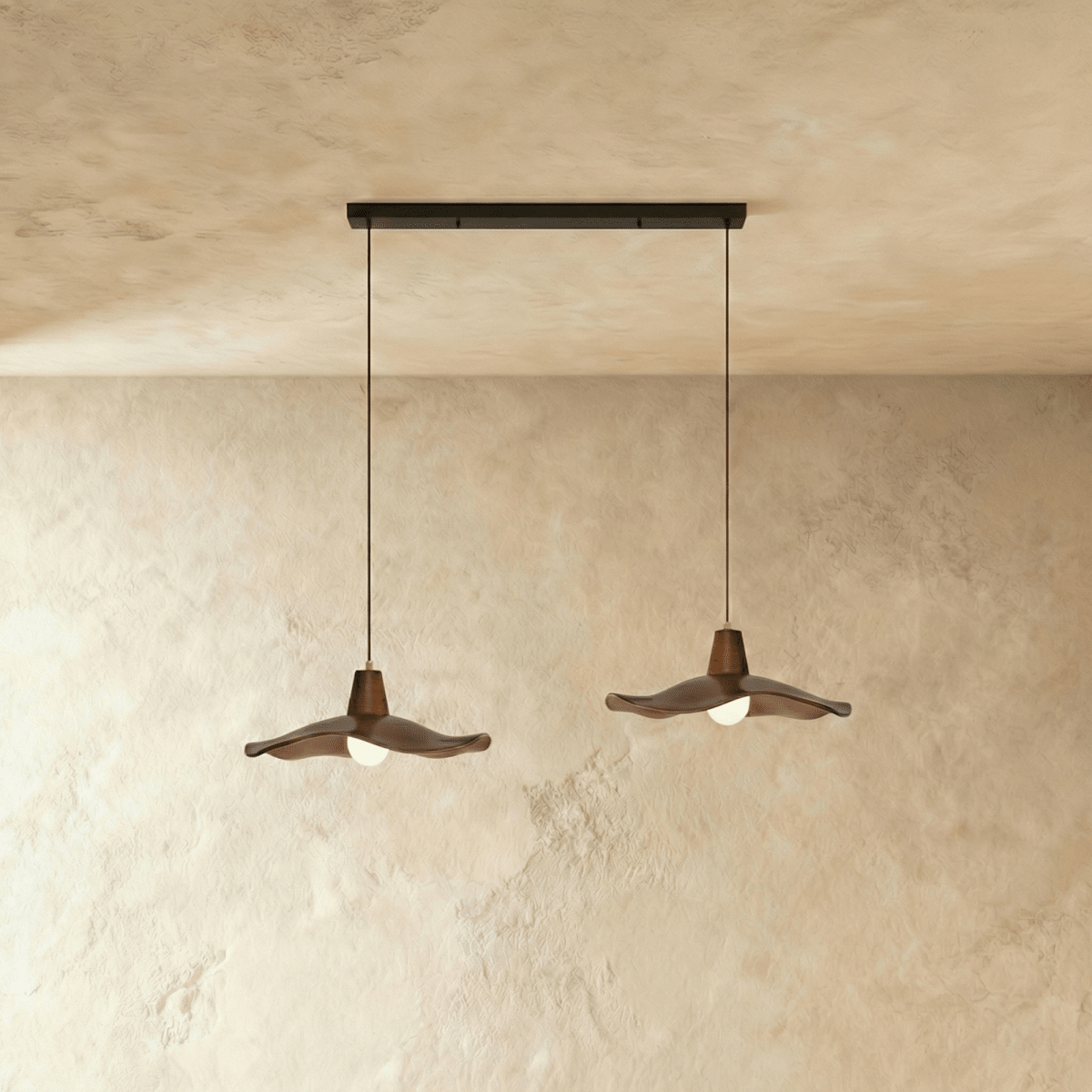 Residence Supply Siraj Pendant Light with sleek metal shade and adjustable cord hanging from ceiling in modern decor style.
