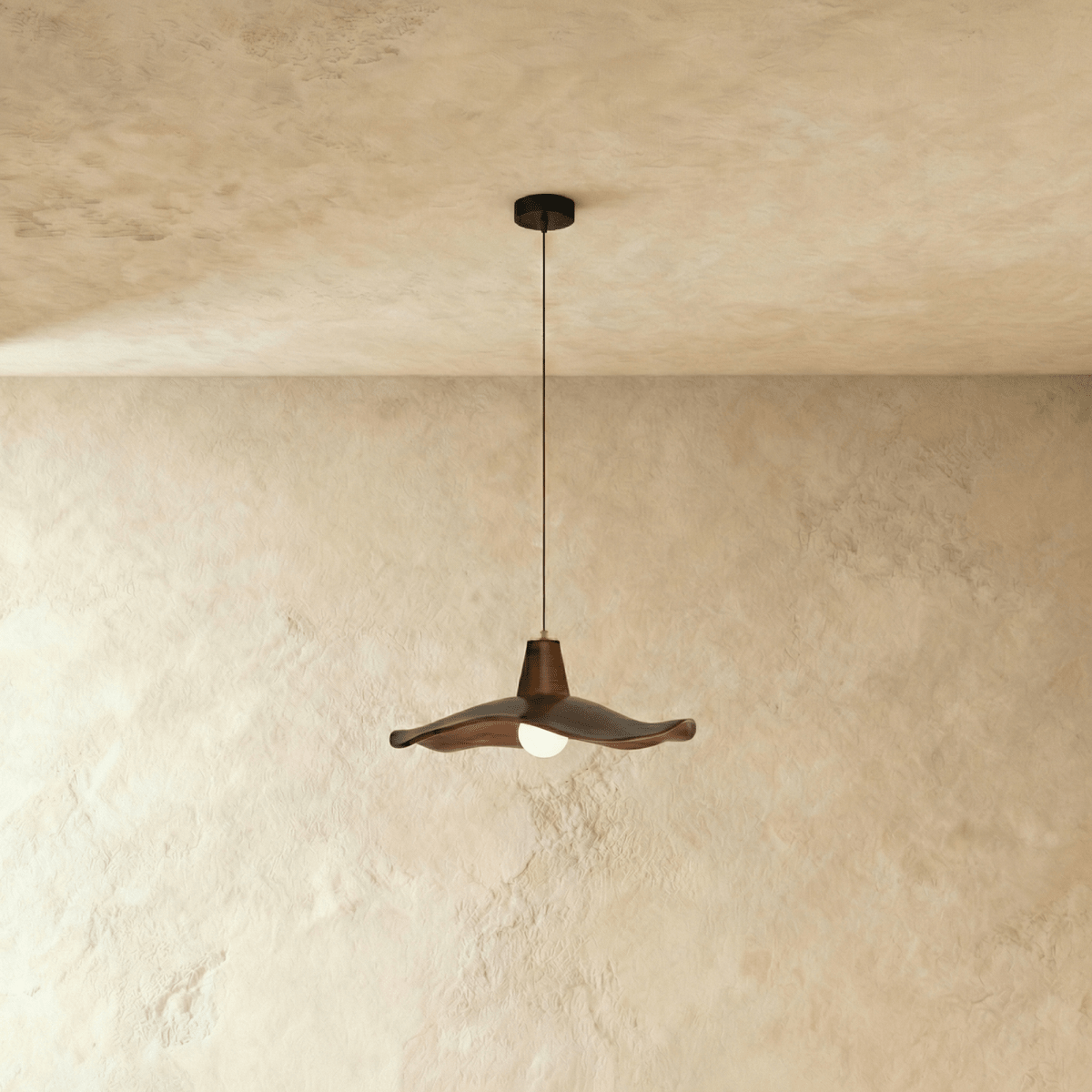 Residence Supply Siraj Pendant Light hanging fixture with a sleek design and modern metal finish.
