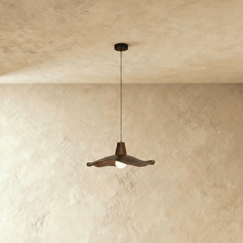 Residence Supply Siraj Pendant Light hanging fixture with a sleek design and modern metal finish.