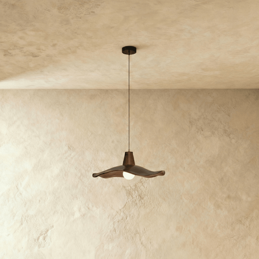 Residence Supply Siraj Pendant Light hanging fixture with a sleek design and modern metal finish.