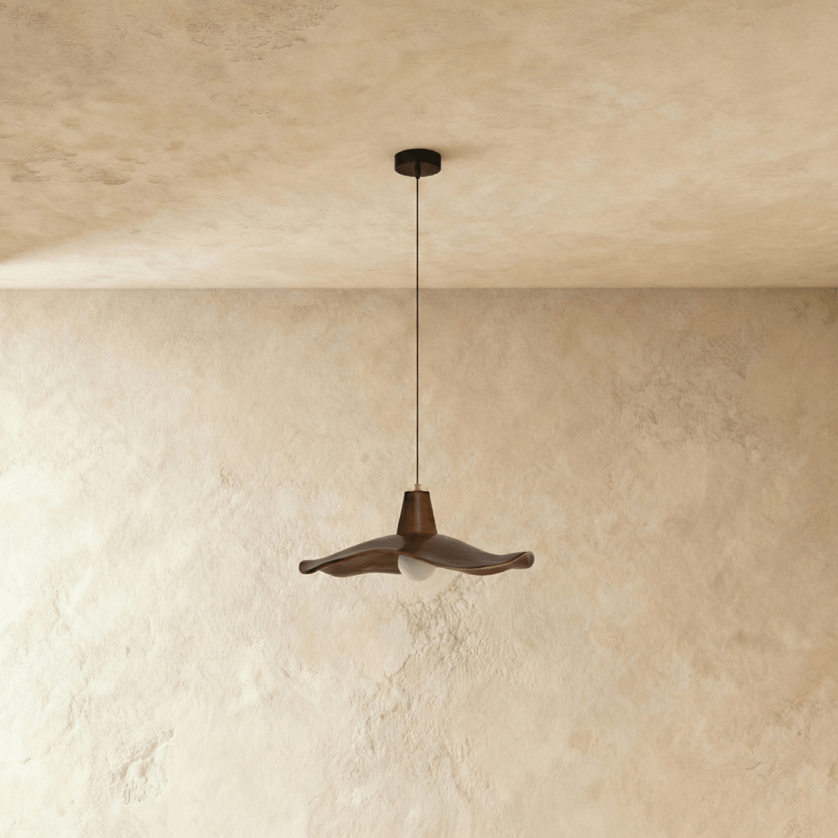 Elegant Siraj Pendant Light by Residence Supply featuring a modern design with a sleek metal finish and warm illumination.