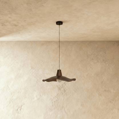 Elegant Siraj Pendant Light by Residence Supply featuring a modern design with a sleek metal finish and warm illumination.
