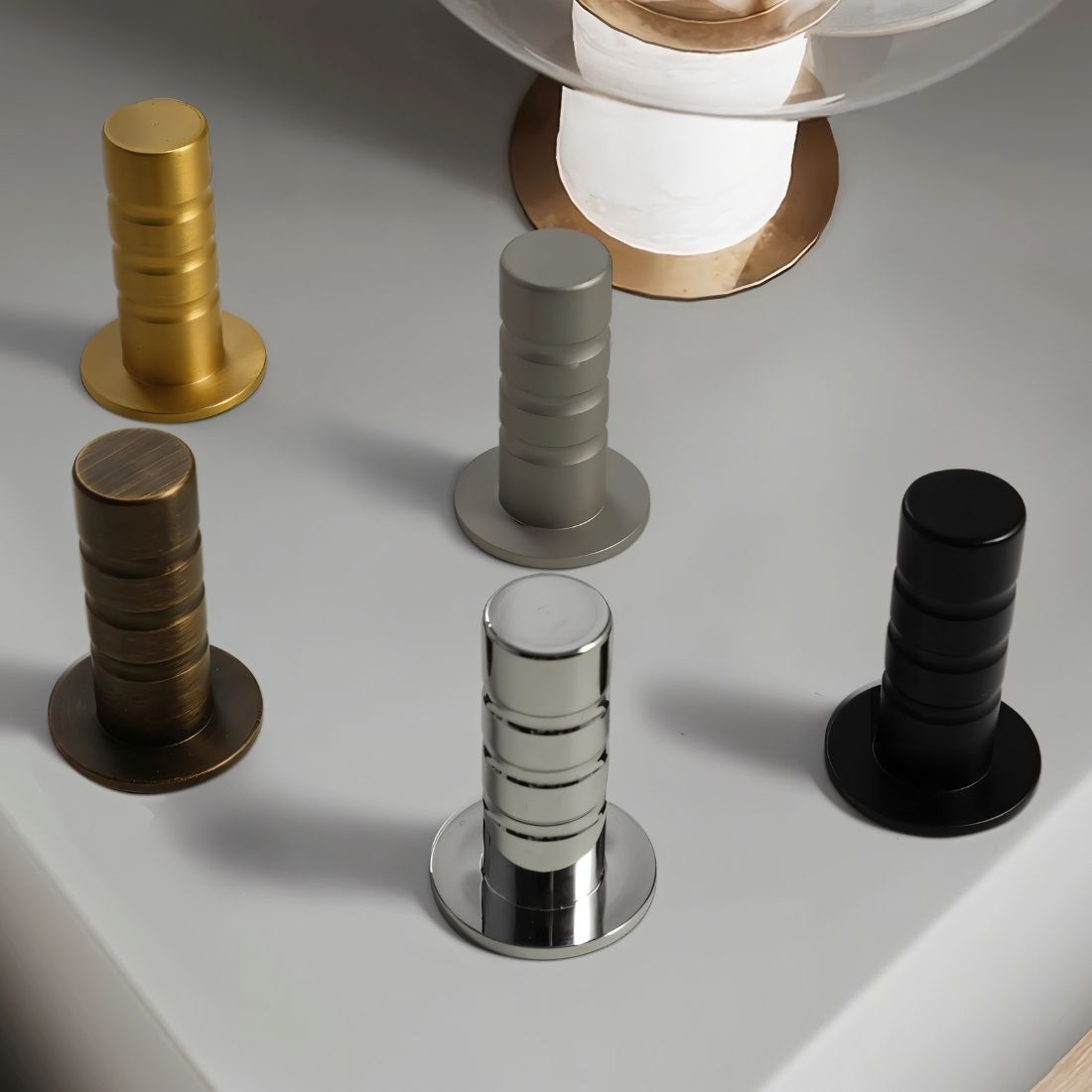 Magnetic door stop by Residence Supply, concealed design, mounted on wall to hold door open or prevent damage.