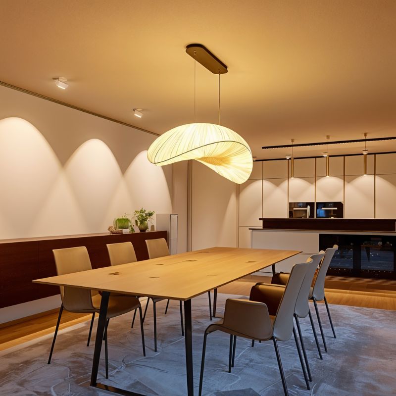 Skafos Chandelier by Residence Supply featuring modern design with multiple hanging glass globes and metal frame.