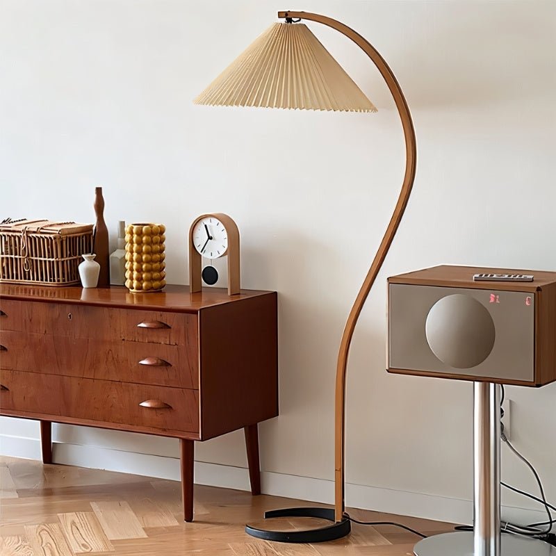 Skiastro Floor Lamp by Residence Supply featuring a modern design with a tall, sleek metal stand and a stylish lampshade.