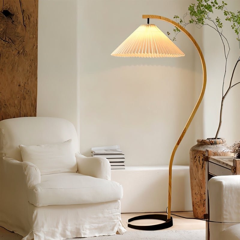 Skiastro Floor Lamp by Residence Supply featuring a sleek modern design with a tall standing structure and adjustable arm.