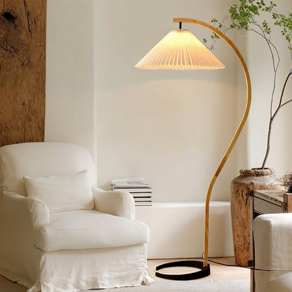 Skiastro Floor Lamp by Residence Supply featuring a sleek modern design with a tall standing structure and adjustable arm.