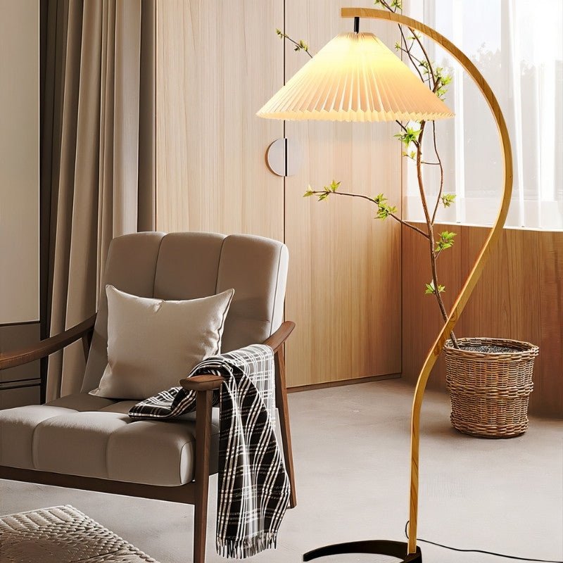 Skiastro Floor Lamp by Residence Supply featuring a modern design with a sleek stand and adjustable lampshade.