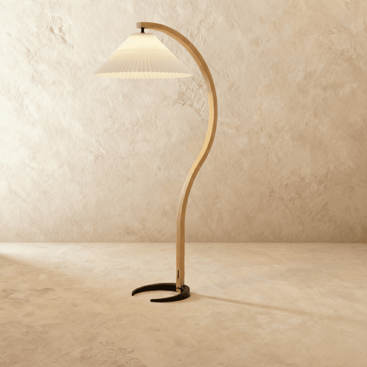 Modern Skiastro Floor Lamp by Residence Supply with sleek design and adjustable arm, ideal for living rooms or reading corners.