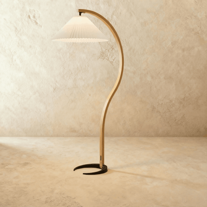 Skiastro Floor Lamp by Residence Supply featuring a modern design with a tall slender stand and a sleek lampshade.