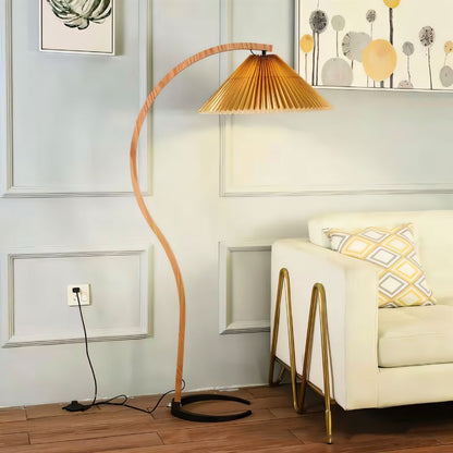 Skiastro Floor Lamp by Residence Supply with a sleek, modern design featuring a tall, cylindrical white shade and metallic base.