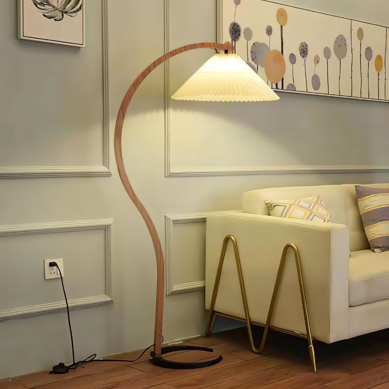 Skiastro Floor Lamp by Residence Supply with a sleek modern design and a tall, slender metal stand and a stylish lampshade.