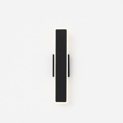 Residence Supply slant wall lamp with adjustable arm and modern design mounted on a neutral-colored wall.