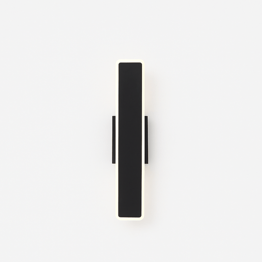 Residence Supply slant wall lamp with adjustable arm and modern design mounted on a neutral-colored wall.