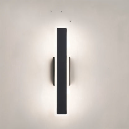 Modern slant wall lamp by Residence Supply with sleek metal arm and adjustable shade, mounted on a wall for stylish lighting.
